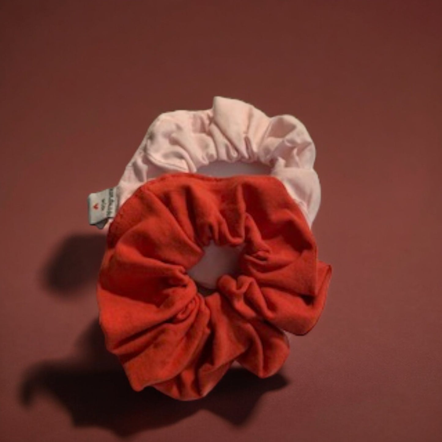 Girls pink and orange scrunchies