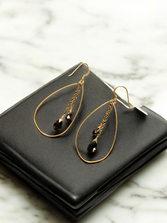 Gold and black color hoop earrings